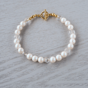 Rayne Glass Crystal Bracelet Sets of Pearlescent White Swarovski 6mm glass pearls looks fabulous in their frosty iridescence sitting each