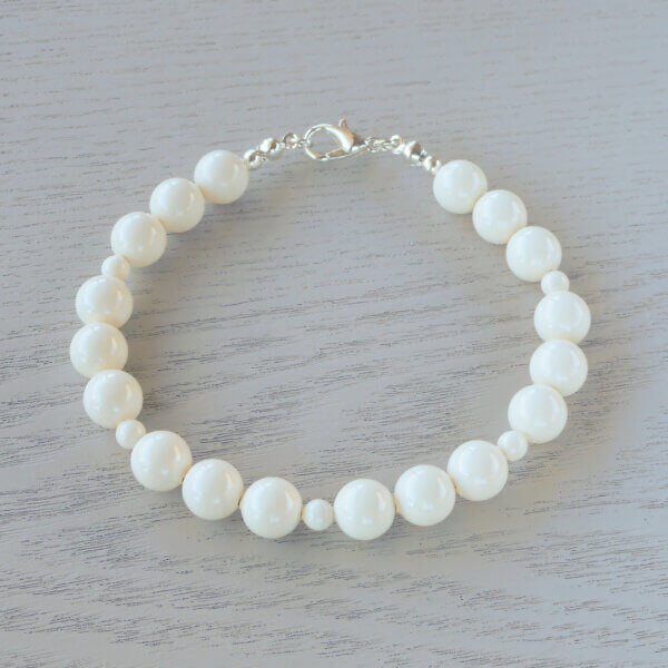 Rosalind Glass Crystal Bracelet The rich cream of 4mm & 8mm Ivory Swarovski glass pearls create this charming bracelet.  This beautiful