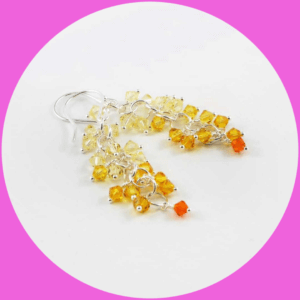 yellow orange chandelier earrings in pink circle frame